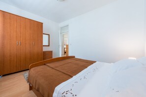 Appartamento (Three-Bedroom Apartment with Balcony ) | 3 camere, culle/letti per bambini (a pagamento)