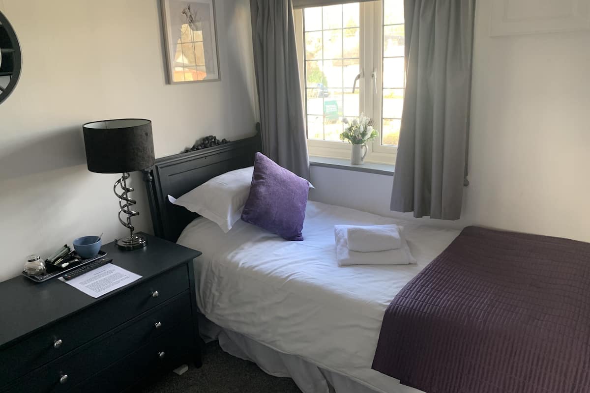 Quarto solteiro, suíte | 1 quarto