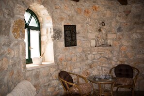 Studio, Sea View (Stone Windmill) | Living area | 24-inch flat-screen TV with digital channels, TV - Potamitis Windmills & Apartments (Zakynthos)