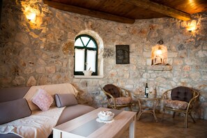 Studio, Sea View (Stone Windmill) | Living area | 24-inch flat-screen TV with digital channels, TV - Potamitis Windmills & Apartments (Zakynthos)