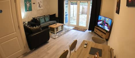 Comfort House | Living area | Flat-screen TV