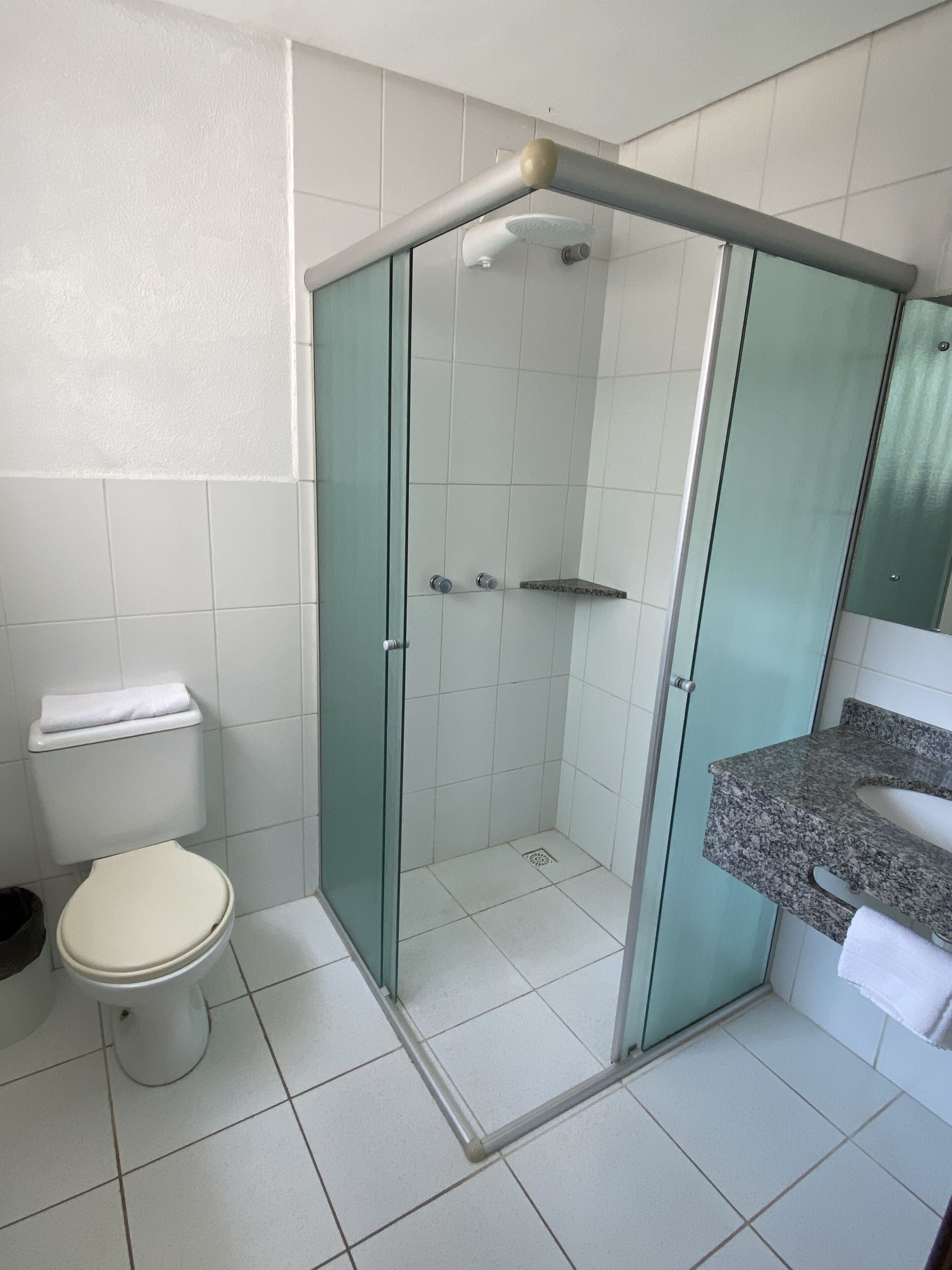 executive triple room, multiple beds | bathroom | shower, towels