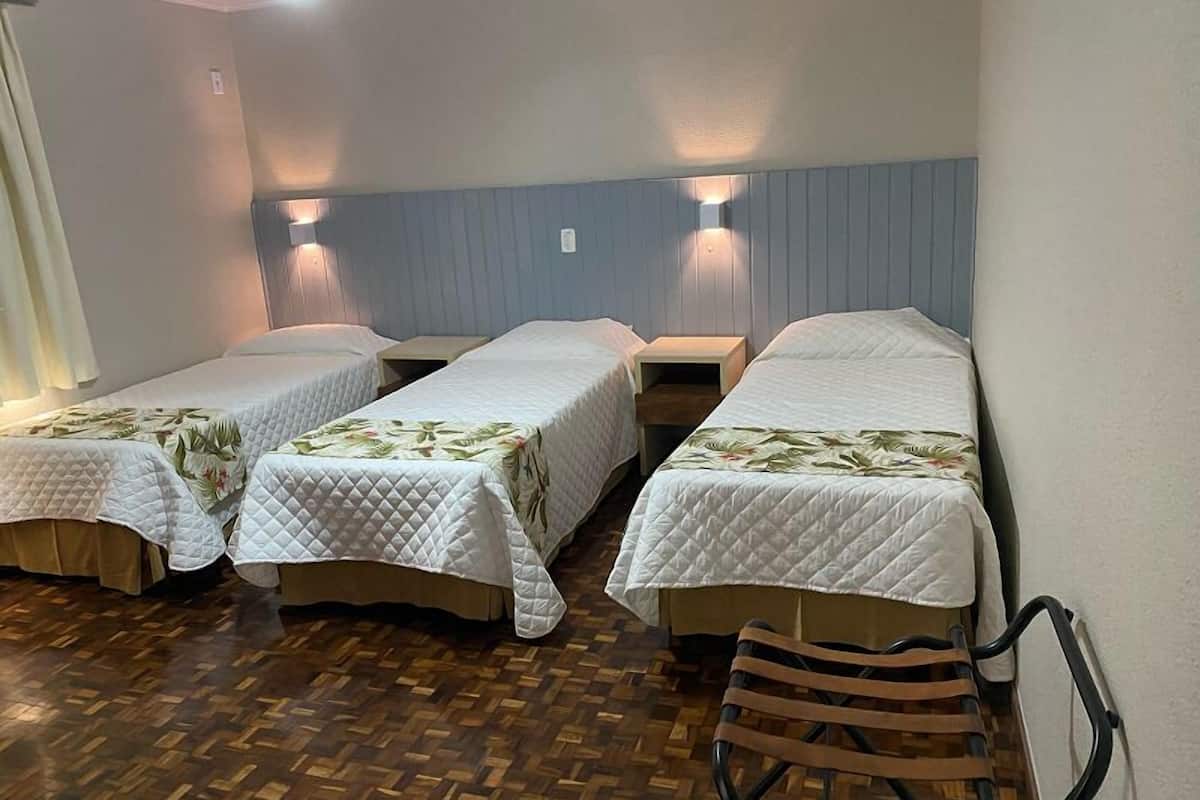 executive triple room, 3 single beds | desk, blackout curtains, soundproofing, free wifi