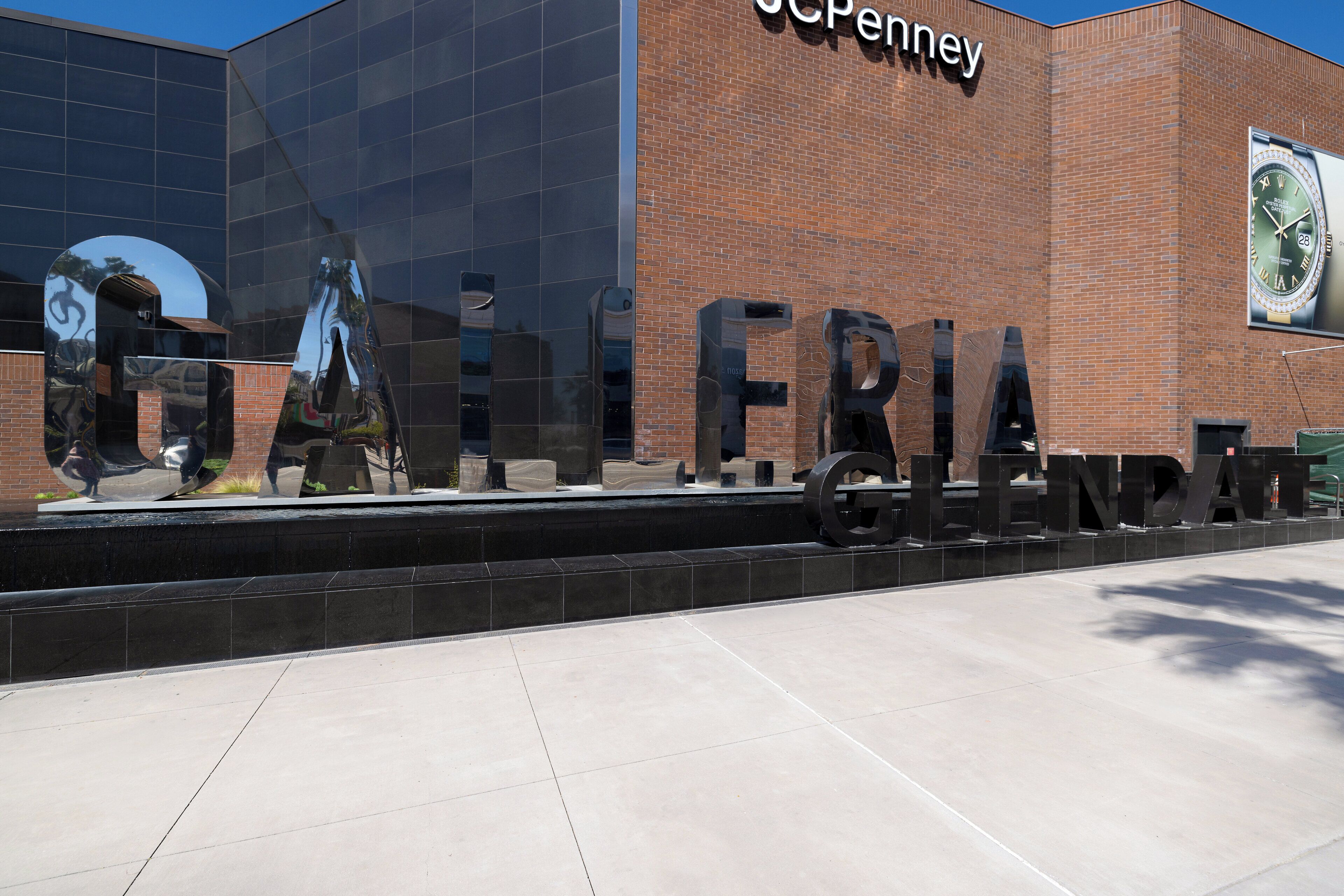 A building facade with the words 'Galleria' and 'SCPenney' prominently displayed.