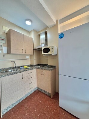 Fridge, microwave, coffee/tea maker, electric kettle