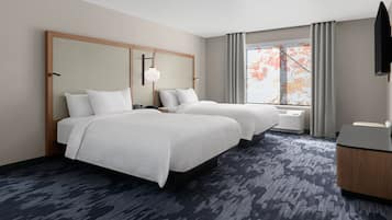 Desk, laptop workspace, iron/ironing board, free cots/infant beds