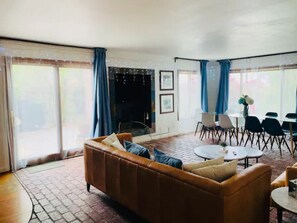 Smart TV, fireplace, books, offices