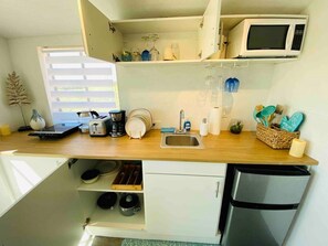 Fridge, microwave, stovetop, coffee/tea maker