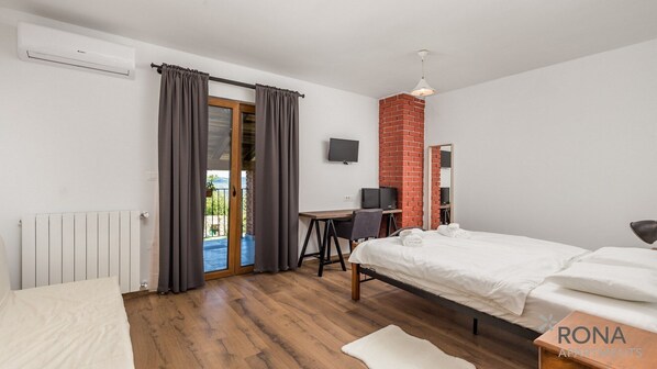 1 chambre, fer et planche Ă repasser, Wi-Fi gratuit, draps fournis