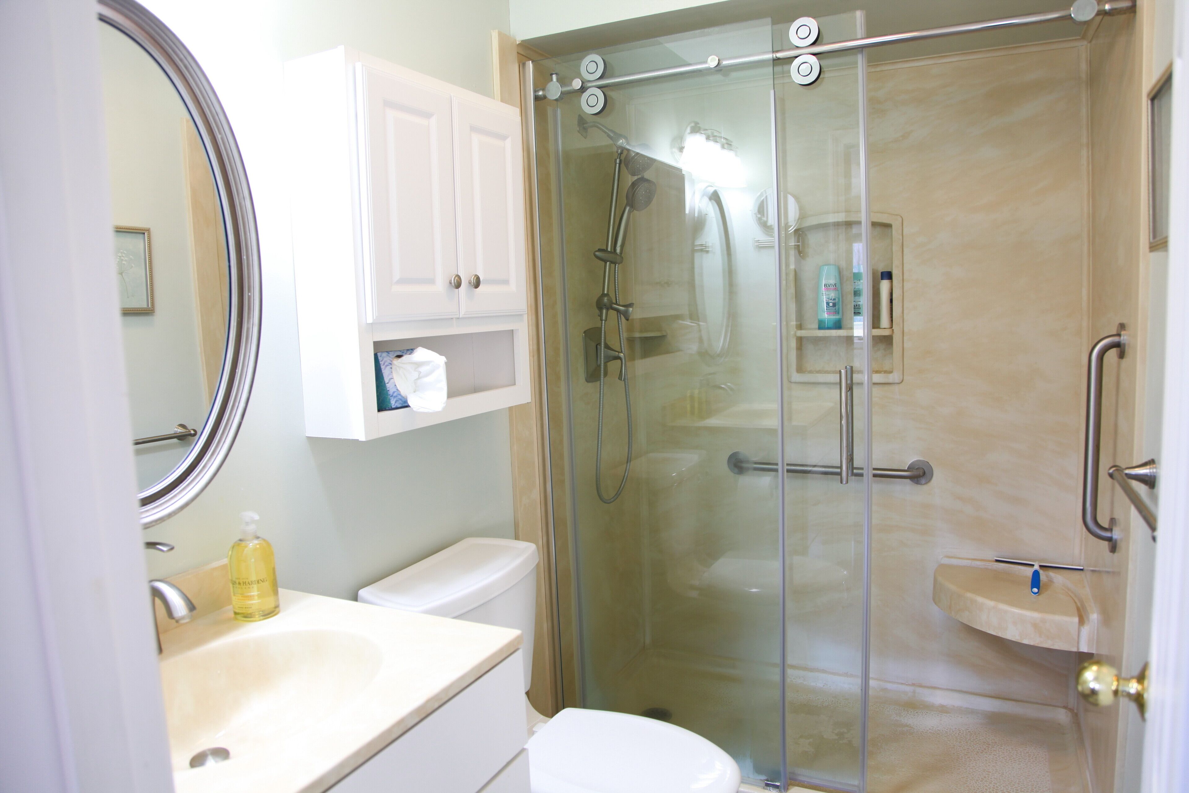Combined shower/bathtub, hair dryer, towels, soap