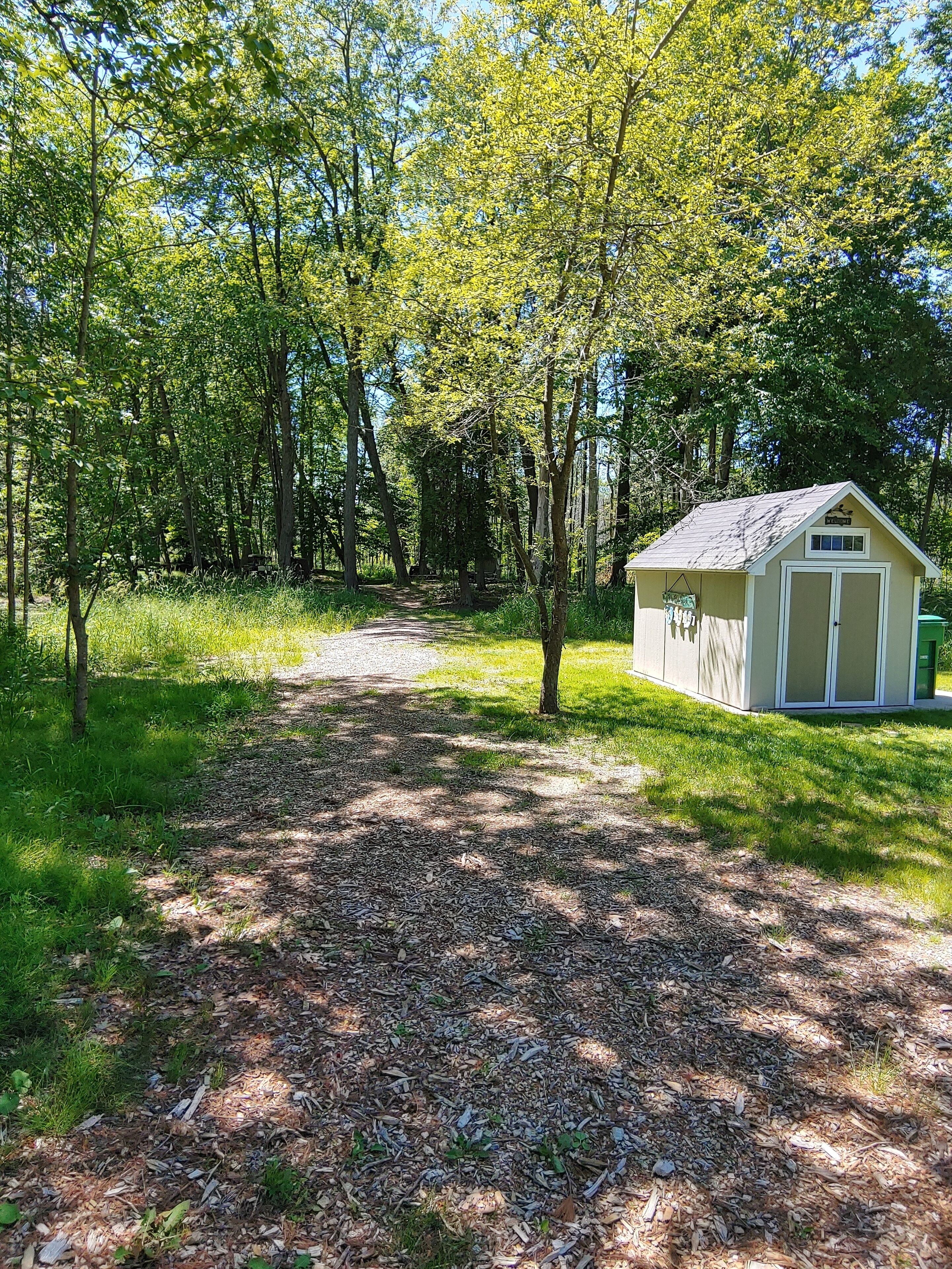 Pathway from cottage to the back firepit. Our "Time Out" space. Facing West