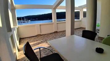 Room, 1 Bedroom, Smoking, Balcony | Living area | Flat-screen TV