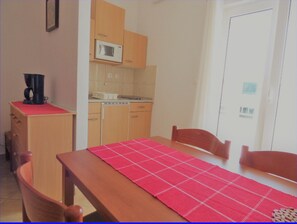 Apartamento, 1 quarto, sacada, vista para a cidade | Área de estar