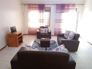 Apartment, 3 Bedrooms, Smoking, Balcony | Living area | TV - Either for Business or Pleasure Perfect Choice Wail in Kampala (Kampala)
