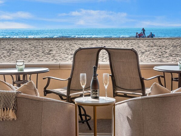 On the beach, sun loungers, beach towels