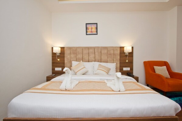 In-room safe, individually decorated, laptop workspace