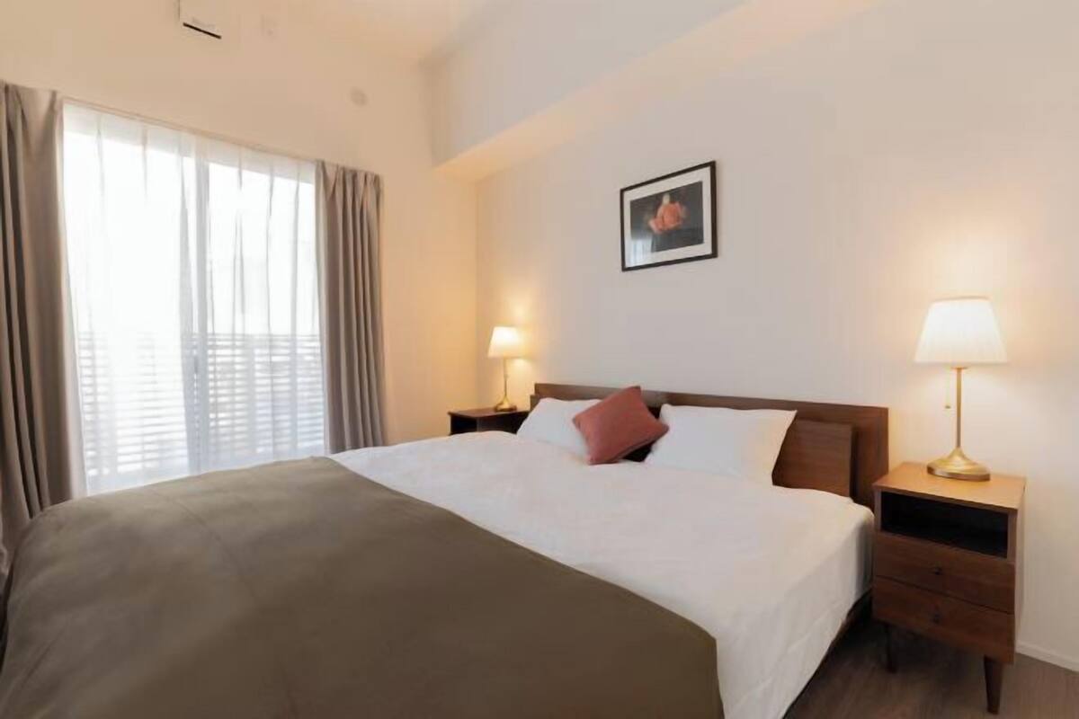 1 bedroom, laptop workspace, blackout curtains, soundproofing