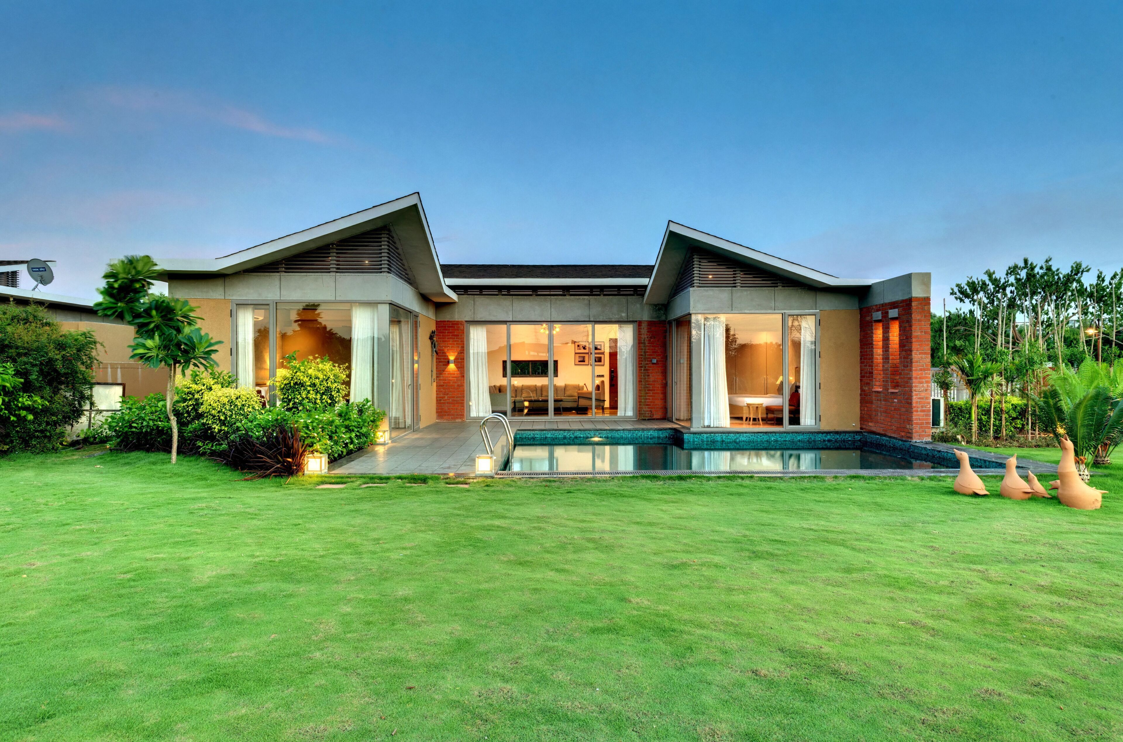 Fern Club Premium 2BHK Royal Garden Pool | In-room safe, soundproofing, iron/ironing board, free WiFi