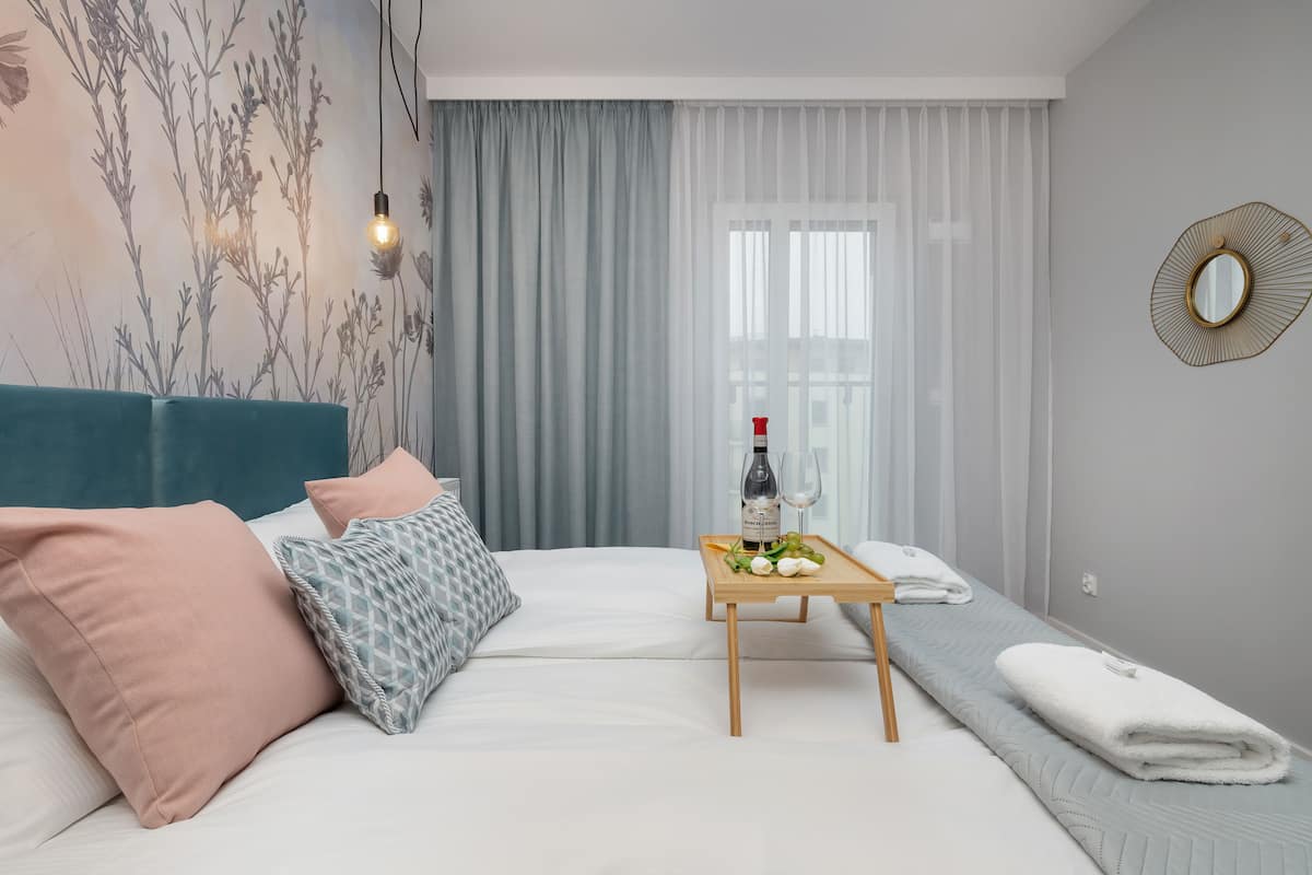 Apartment, 2 Bedrooms, Balcony | 7 bedrooms, individually decorated, individually furnished