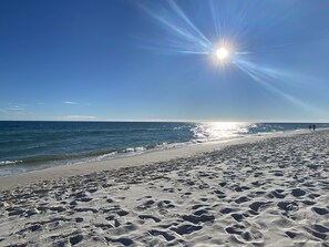 On the beach, sun-loungers