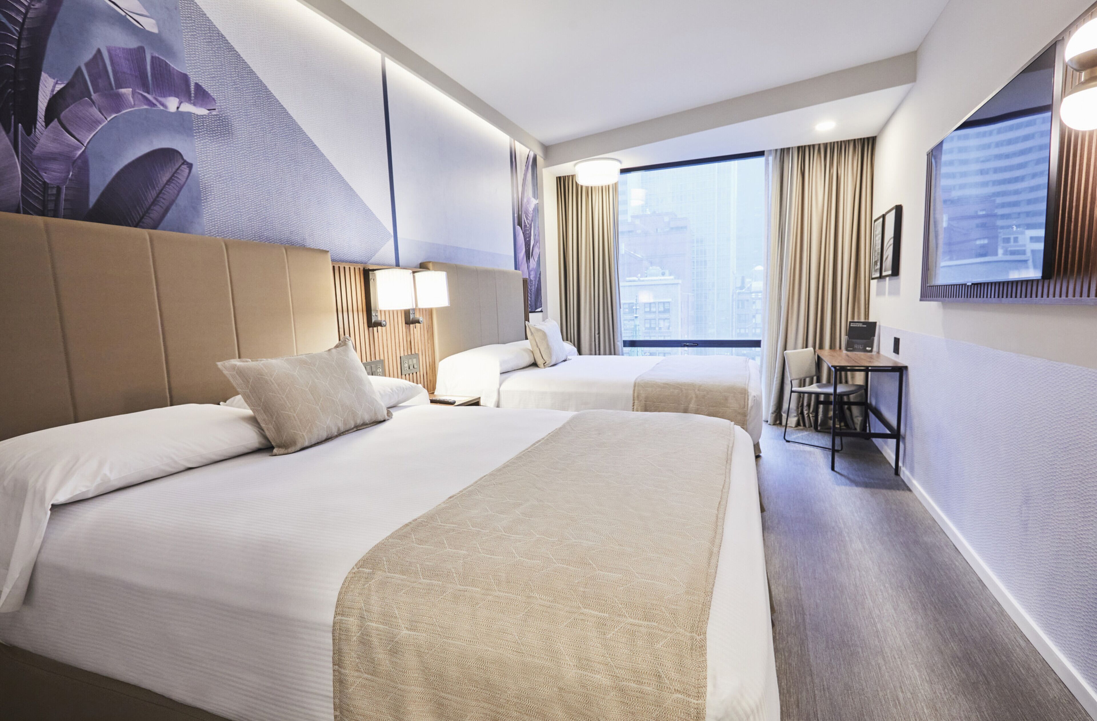 deluxe room, 2 queen beds | 1 bedroom, in-room safe, desk, soundproofing