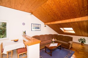 Apartment (Two-Bedroom Apartment with Balcony an) | Living room | TV