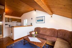 Apartment (Two-Bedroom Apartment with Balcony an) | Living room | TV