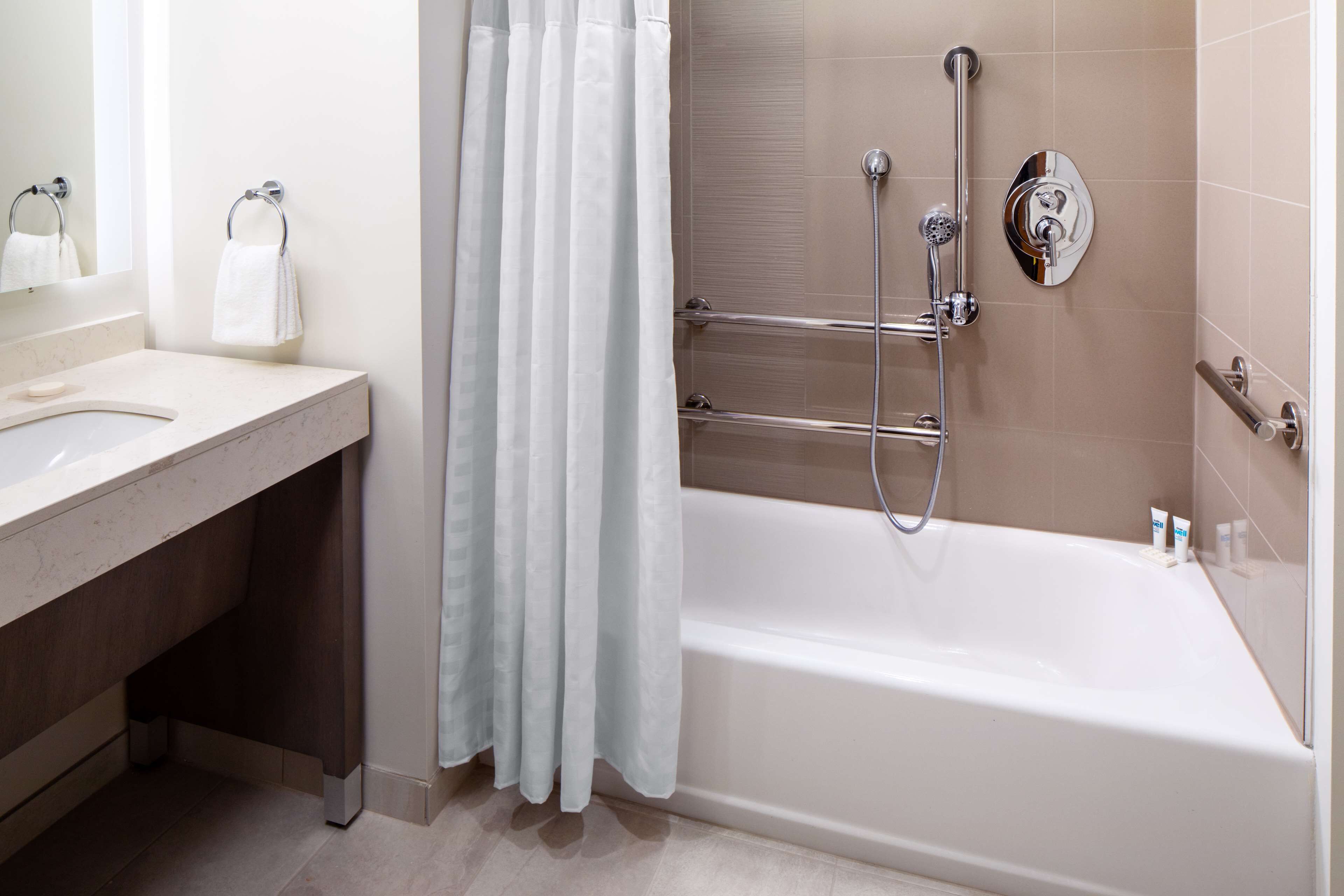 suite, 1 bedroom, accessible, bathtub | bathroom | hair dryer, towels, soap, shampoo