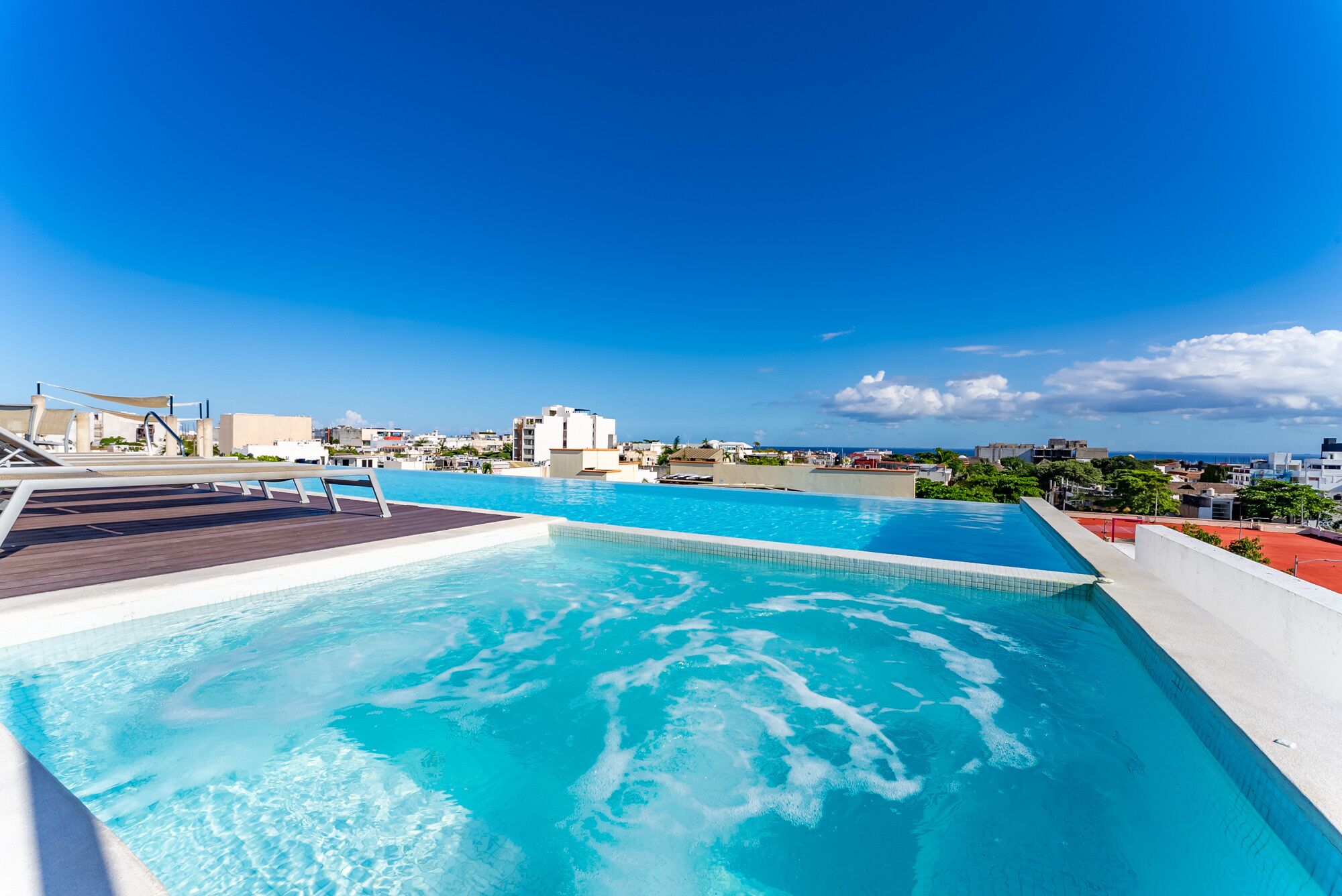 An infinity pool, a rooftop pool