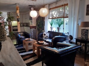 Tv, eldstad, dvd-spelare och böcker