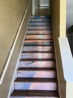 A staircase with a unique marble design.