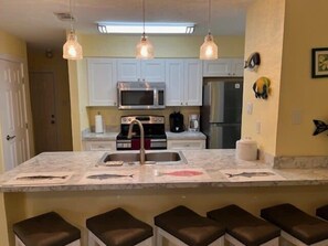 Fridge, microwave, oven, stovetop - Sunny Days! - One block from the beach - Island Dunes Condo's- Unit 1500 (Port Aransas)