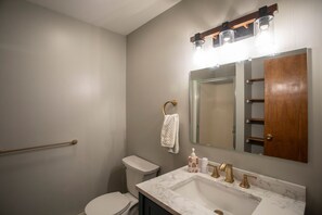 Bathtub, hair dryer, towels, soap