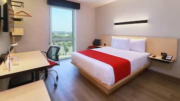 Desk, laptop workspace, blackout drapes, iron/ironing board