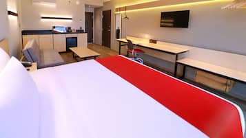 Desk, laptop workspace, blackout drapes, iron/ironing board