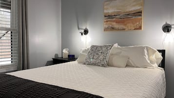 1 bedroom, desk, iron/ironing board, travel crib