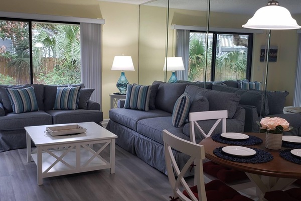 Living Room- Couch with queen size sleeper (gel foam mattress) and Love Seat