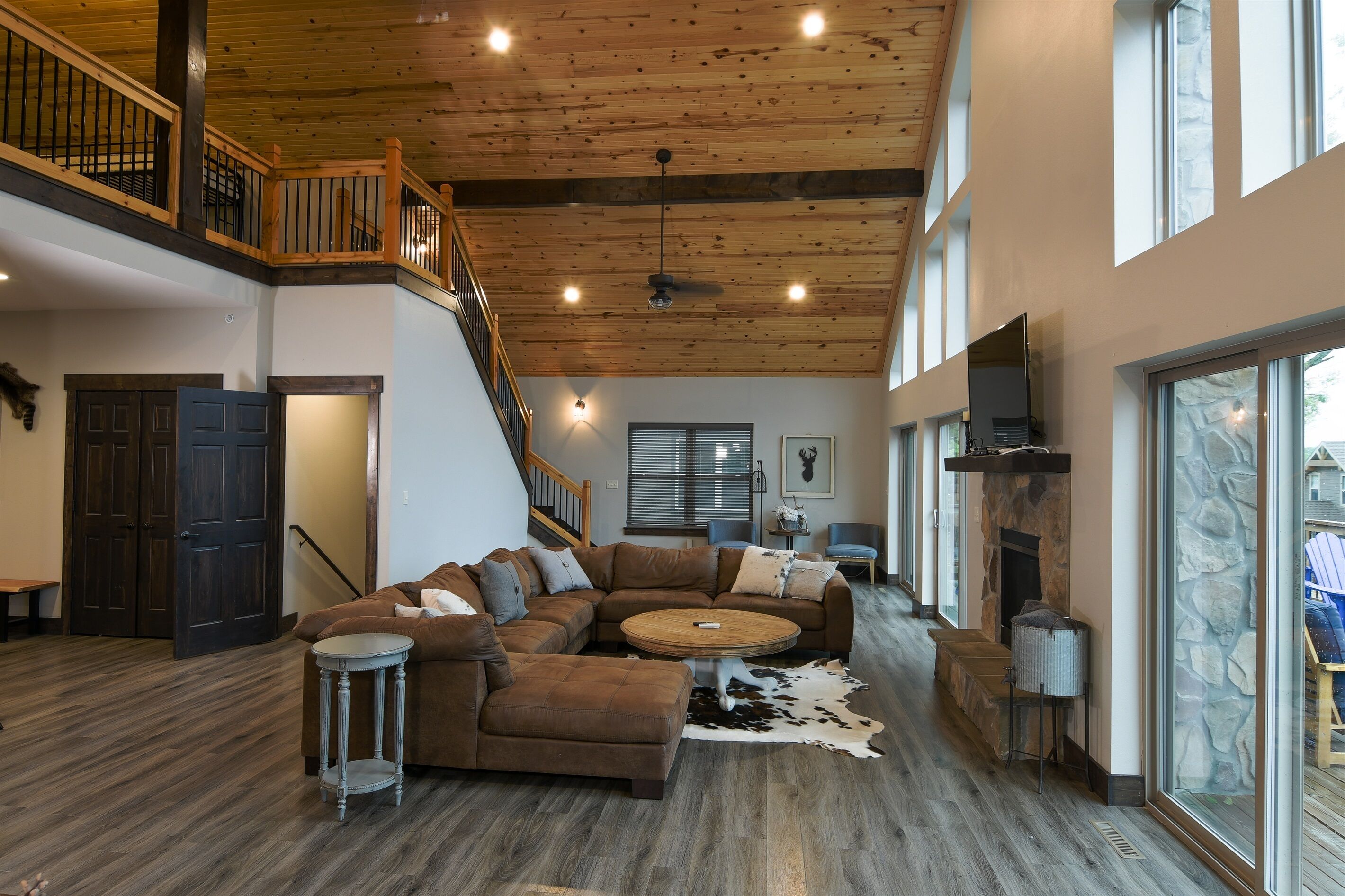 Flat-screen TV, fireplace, smart speakers