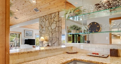 Spacious, three-story lakefront home with deck, kitchen & pools - dog-friendly