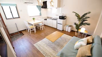 Apartment, Non Smoking | Living area | 32-inch flat-screen TV with digital channels, TV