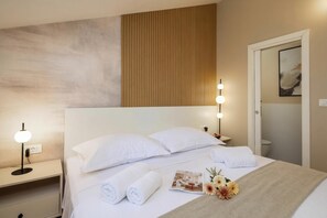 3 slaapkamers, een strijkplank/strijkijzer, gratis wifi, beddengoed
