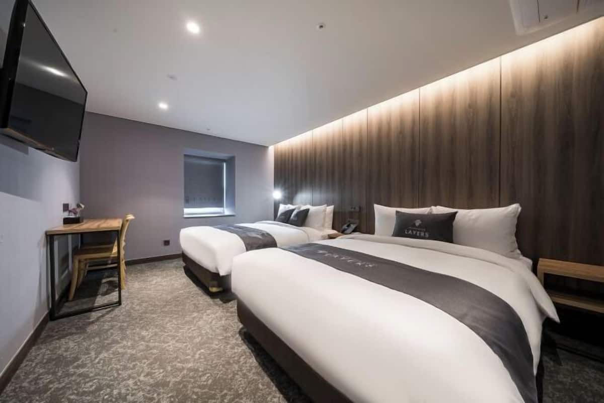 Down comforters, memory foam beds, in-room safe, blackout drapes