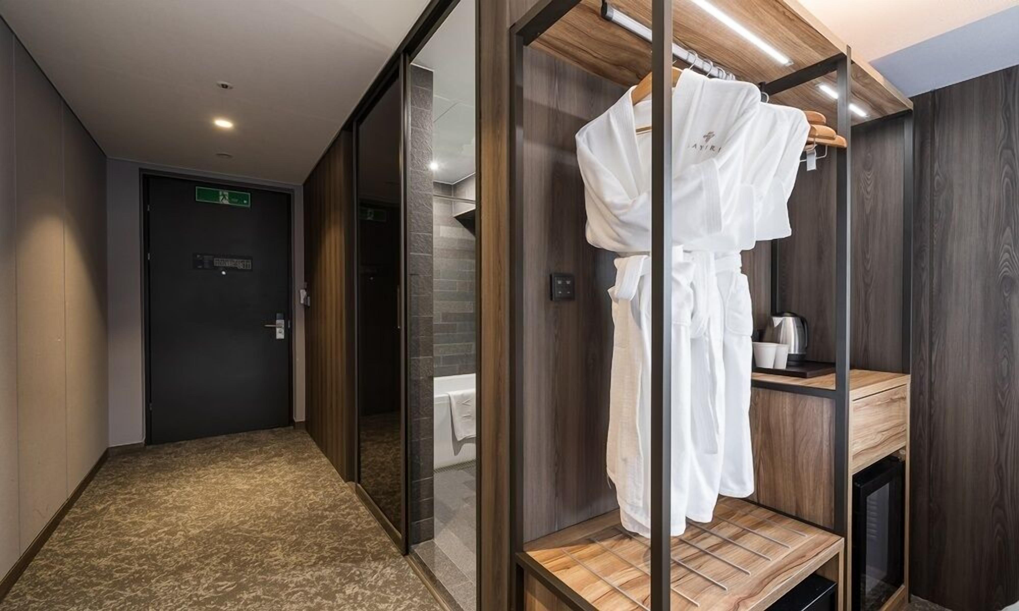 deluxe quadruple room, 2 double beds | down duvets, memory-foam beds, in-room safe, individually decorated