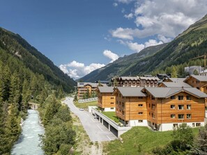 Situated beside a serene river, this hotel offers breathtaking views of the surrounding mountains and lush greenery.