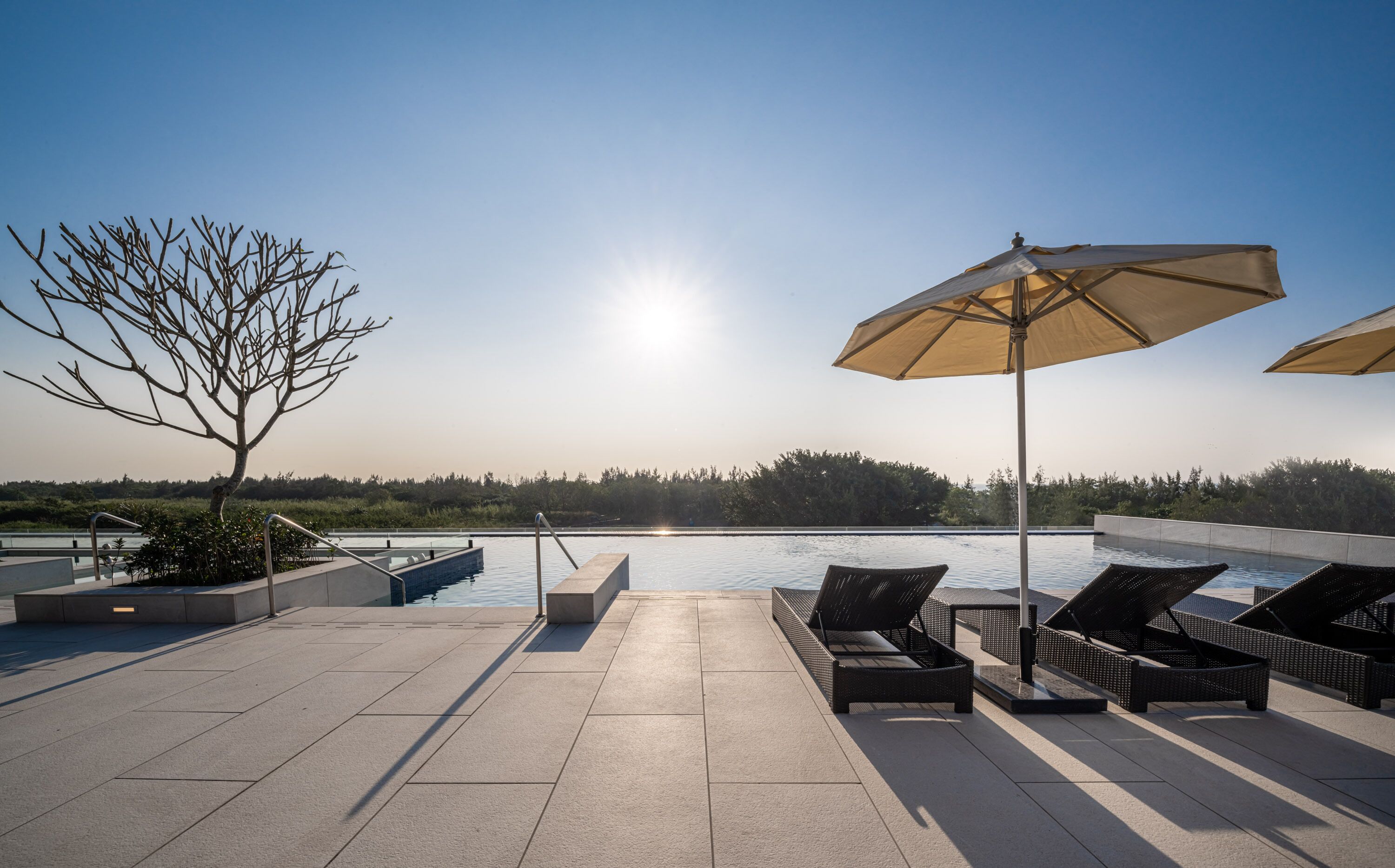 outdoor pool, open 7:00 am to 10:00 pm, pool umbrellas, pool loungers