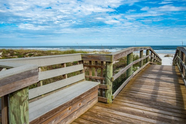 Beach nearby, beach towels, surfing, motor boating