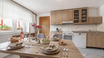 Family House, Multiple Bedrooms (Mržek House with Sauna) | Private kitchen | Fridge, oven, stovetop, dishwasher