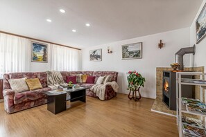 Family House, Multiple Bedrooms (Mržek House with Sauna) | Living area | 21-inch flat-screen TV with digital channels, TV, fireplace - Mržek House with Sauna (Bloke)
