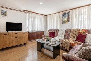 Family House, Multiple Bedrooms (Mržek House with Sauna) | Living area | 21-inch flat-screen TV with digital channels, TV, fireplace - Mržek House with Sauna (Bloke)