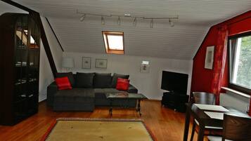 Condo | Living area | 30-inch flat-screen TV with cable channels, TV